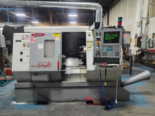 Lot 140 2000 HAAS SL-20 CNC LATHE - C AXIS CAPABLE, PARTS CATCHER, RIGID TAPPING, HIGH PRESSURE COOLANT